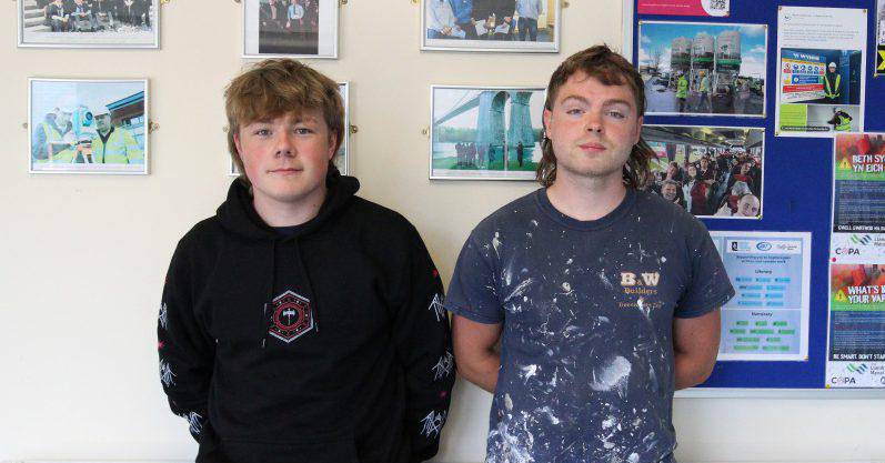 Painting and decorating apprentices Kyle Williams and Nathan Evans