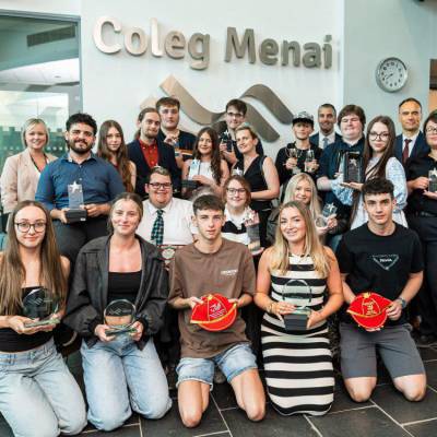 The winners of Coleg Menai’s 2024/25 Achievers’ Awards with their trophies