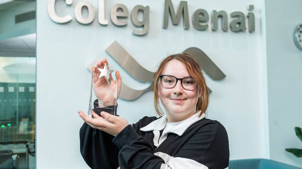 Coleg Menai student Connie Whitfield with her trophy after winning Overall Achiever of The Year at the 2024/25 Achievers’ Awards ceremony