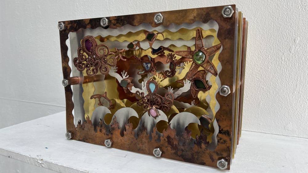 ‘Warming Waters’, a piece of metal artwork by Mali Smith on display at the UAL Origins Creative exhibition in London