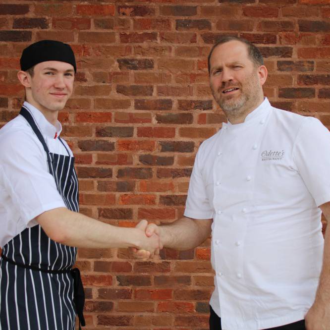 Coleg Llandrillo student Isaac Williams with chef Bryn Williams at his Theatr Clwyd restaurant