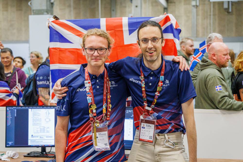 Coleg Menai student Evan Klimaszewski and lecturer Geraint Rowlands at EuroSkills 2025