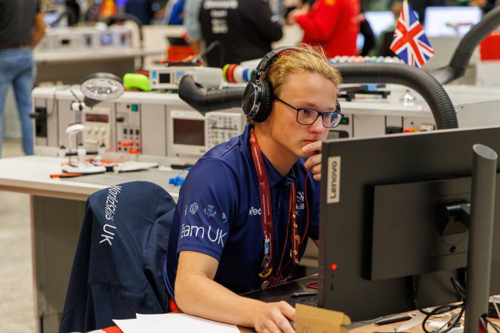 Coleg Menai student Evan Klimaszewski competing in the Electronics category at EuroSkills 2025