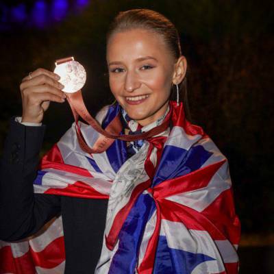 Coleg Llandrillo student Yuliia Batrak with her Medallion for Excellence at EuroSkills 2025
