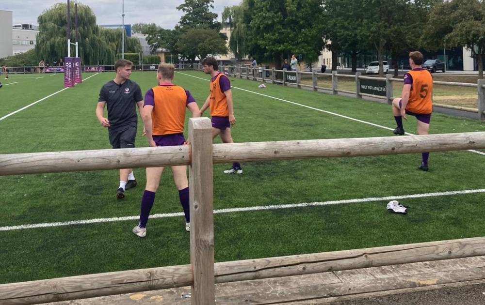 George Watkins coaching with Loughborough University men's rugby team
