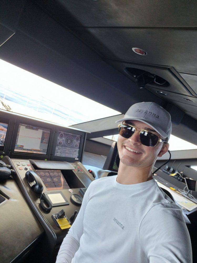 Former Coleg Llandrillo student Harri Would at the controls on a ship’s bridge
