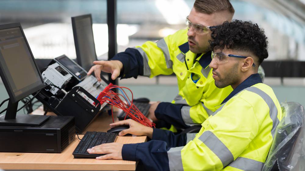 Two people in a workshop