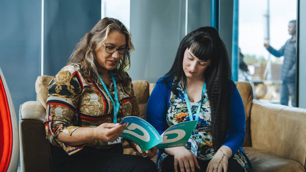 Learner getting advice from a member of the Library staff