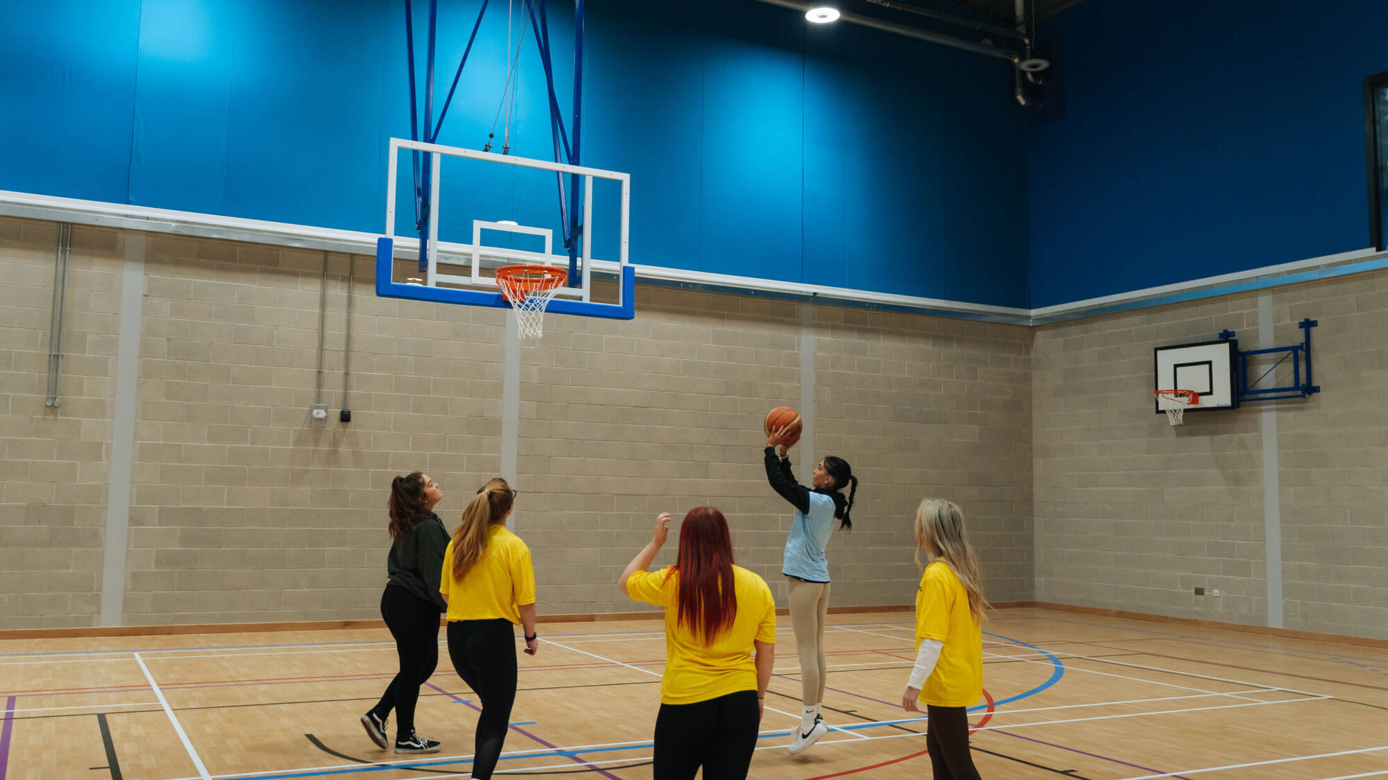 Game of netball in the sports hall