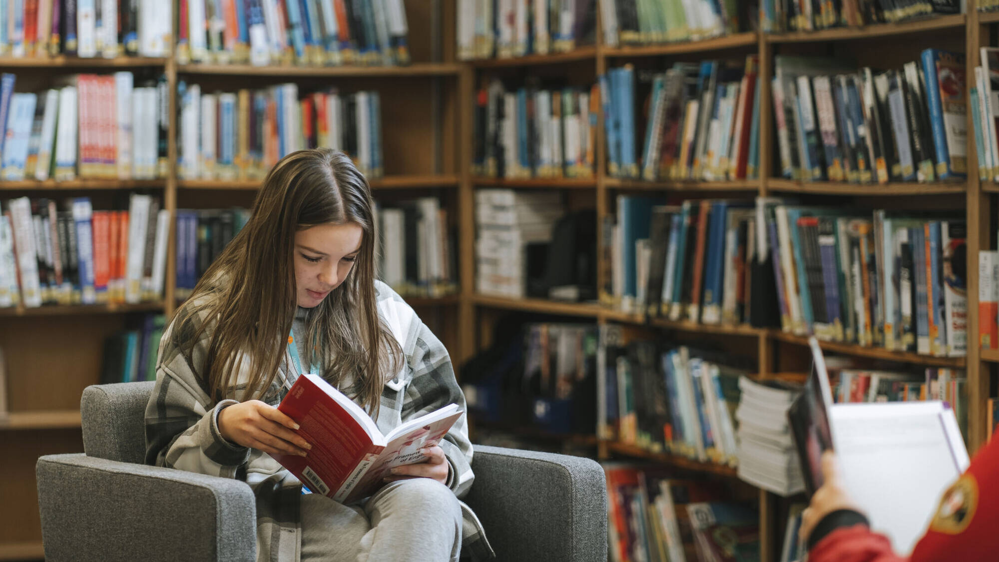 Learner reading in the library