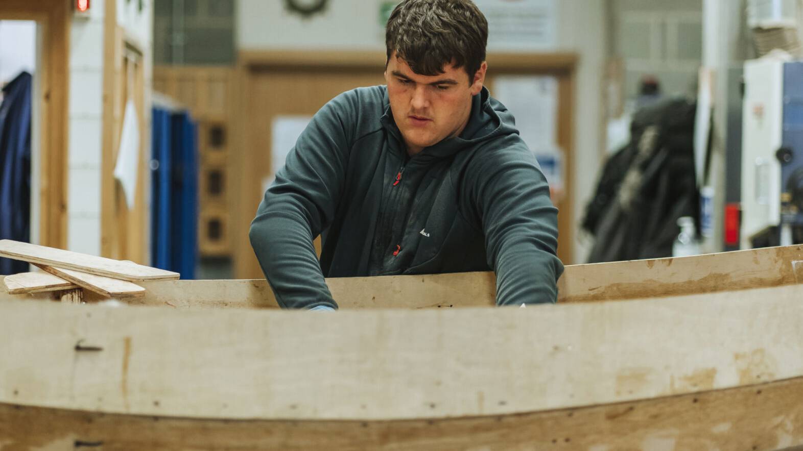 Learner fixing a boat