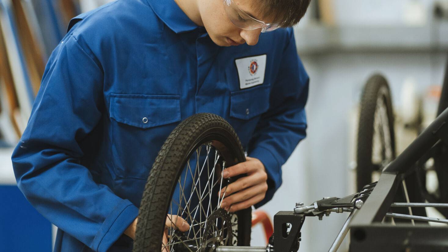 Student working on bike